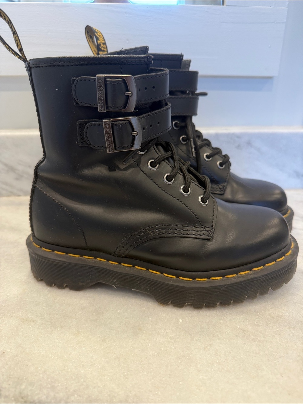 Dr. Martens Black Leather Lug Sole Boots with Yellow Stitching